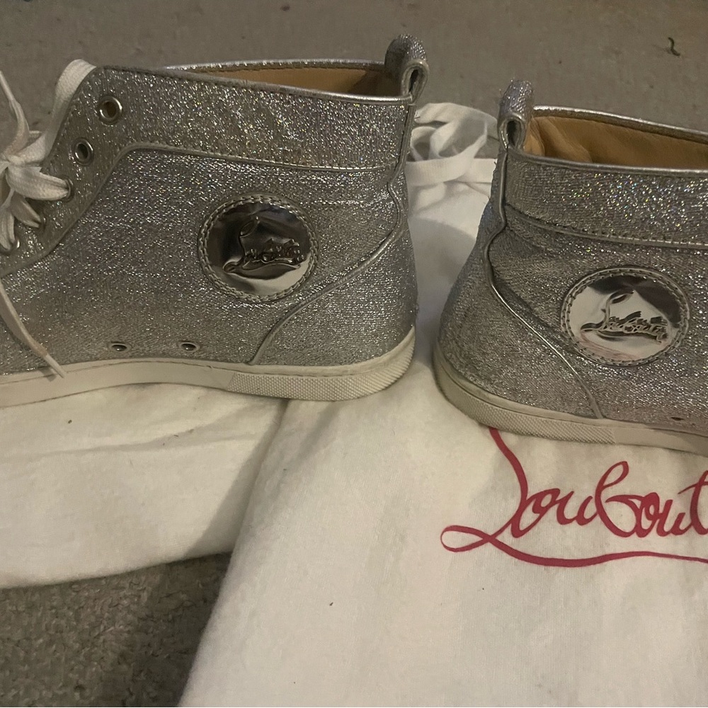 Used Authentic high top Christian Louboutin Sneakers
